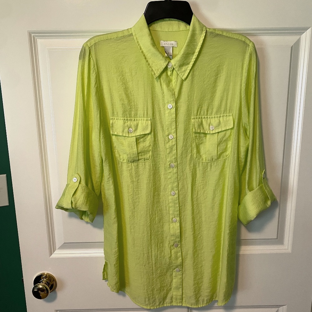 Chico's lightly used blouse with convertible sleeves. Chico's Size 1 (Women's M)